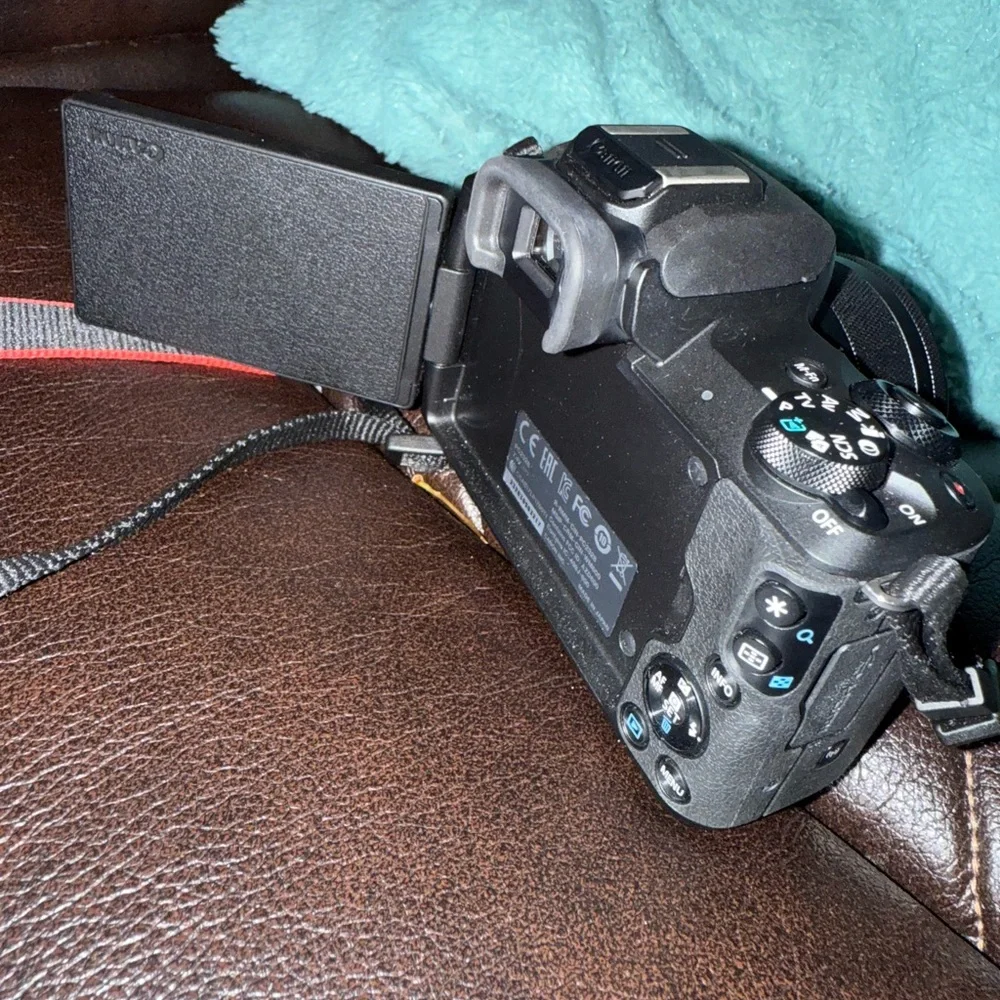 Canon Black DSLR Camera with Strap